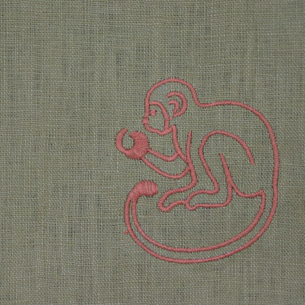 Earthen Pine Napkin displayed as a complete set for luxury entertaining - Ro'Table NYC