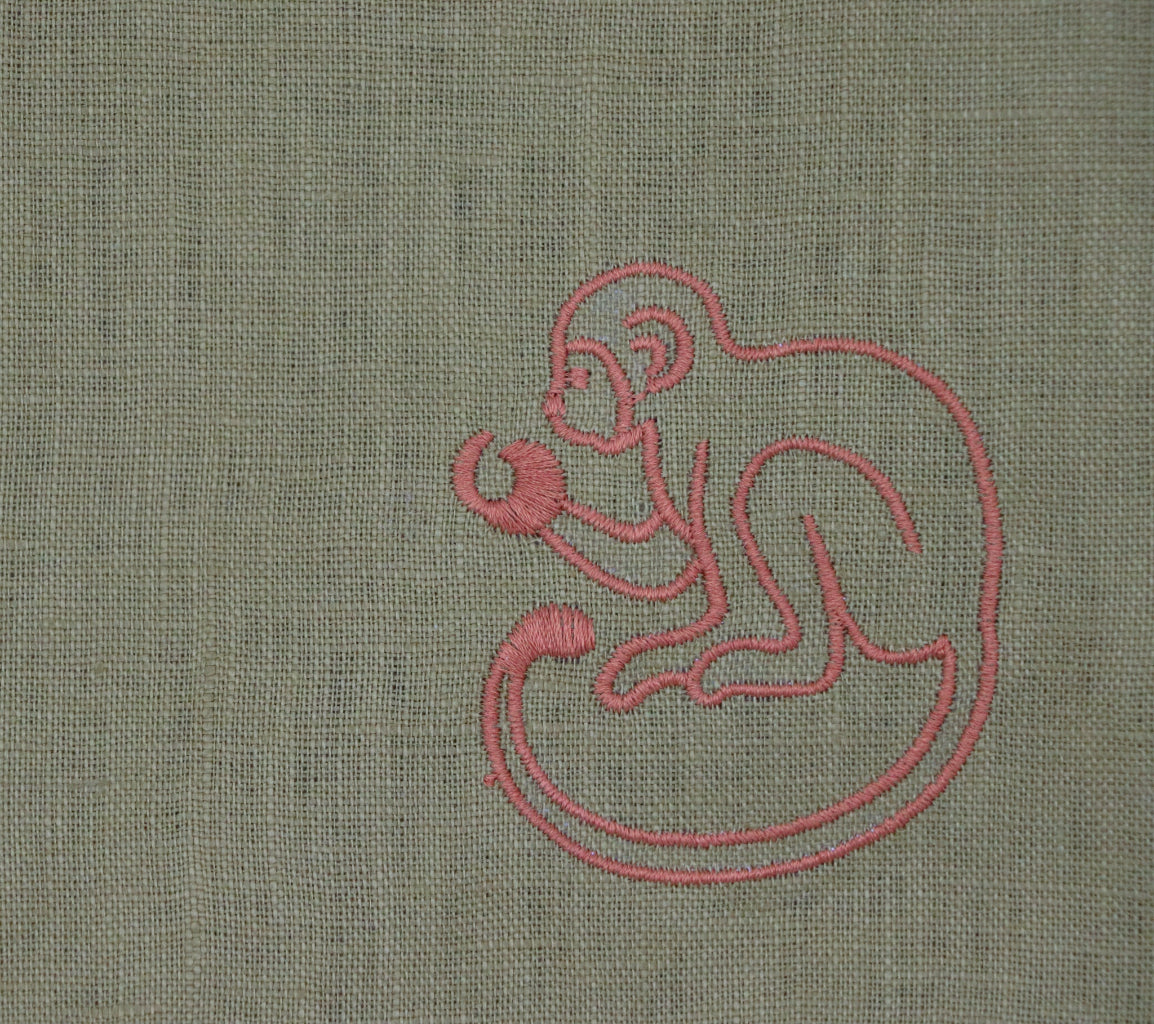 Earthen Pine Napkin displayed as a complete set for luxury entertaining - Ro'Table NYC