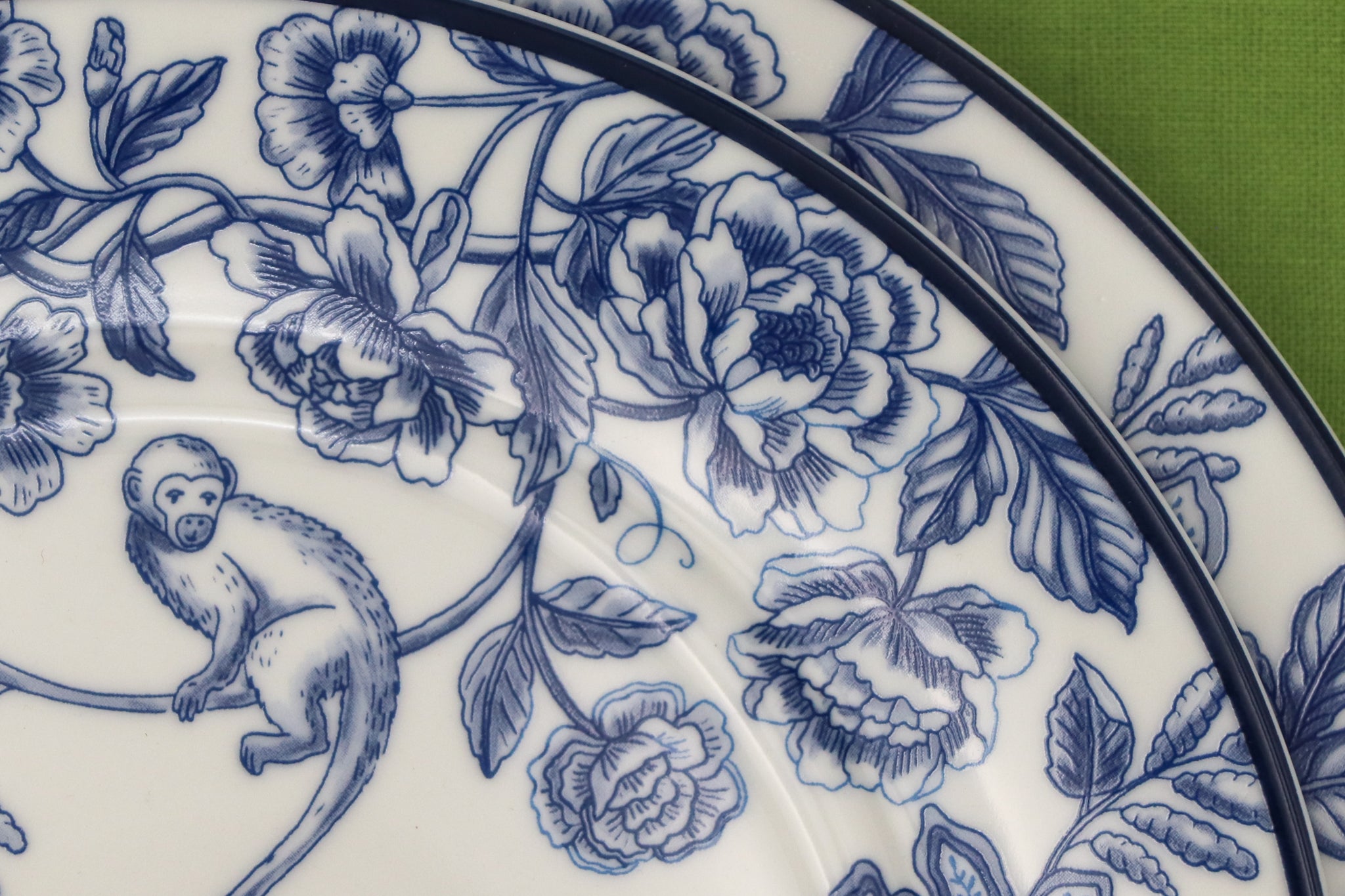 Close-up of Blue Floral Plate with Monkey