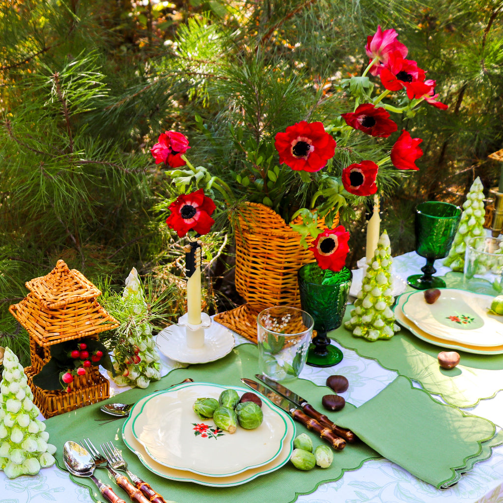 Natural Rattan Urn Vase in a warm dinner party setting with candles and flowers - Ro'Table NYC