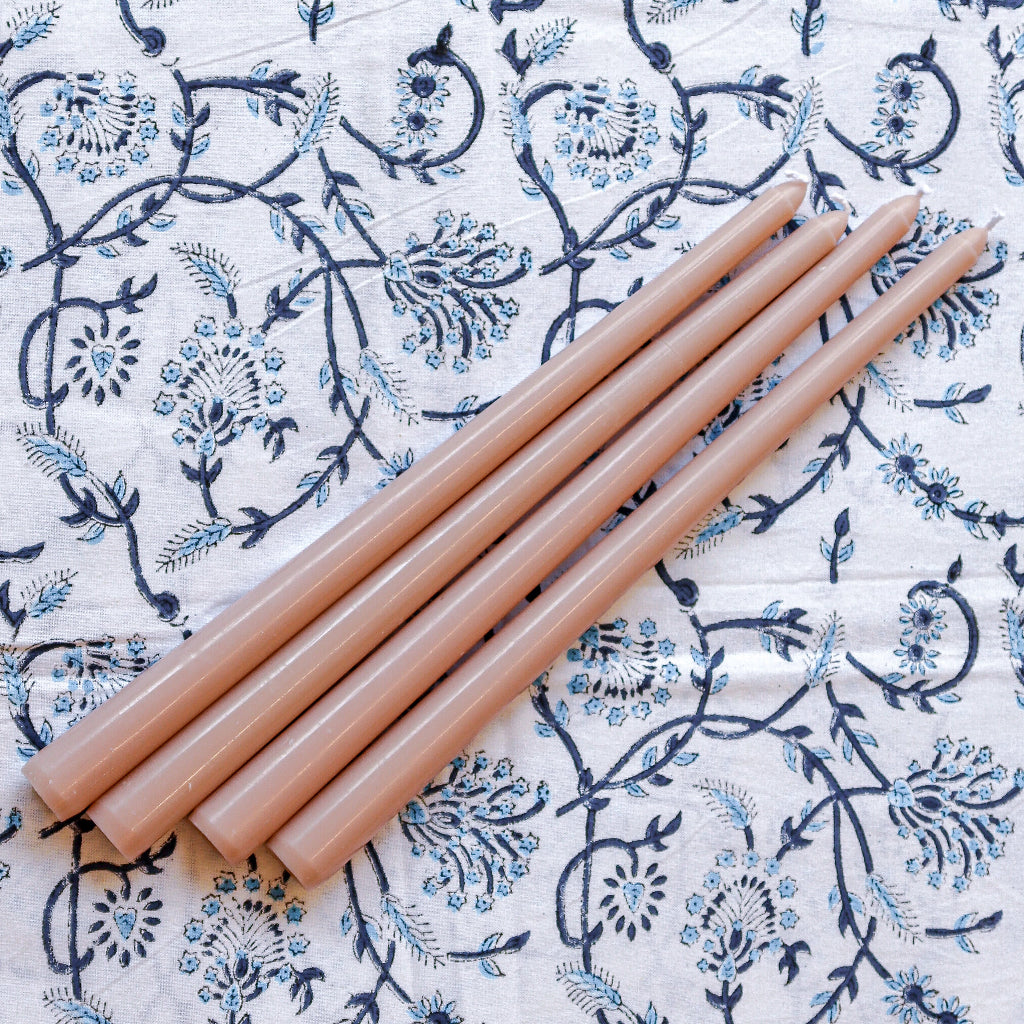 Extra Tall Rose Glow Taper Candle styled on a luxury dinner table setting - Ro'Table NYC