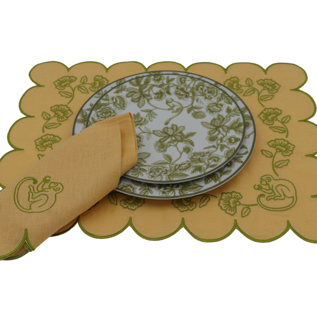 Sunlit Moss Napkin in a warm dinner party setting with candles and flowers - Ro'Table NYC