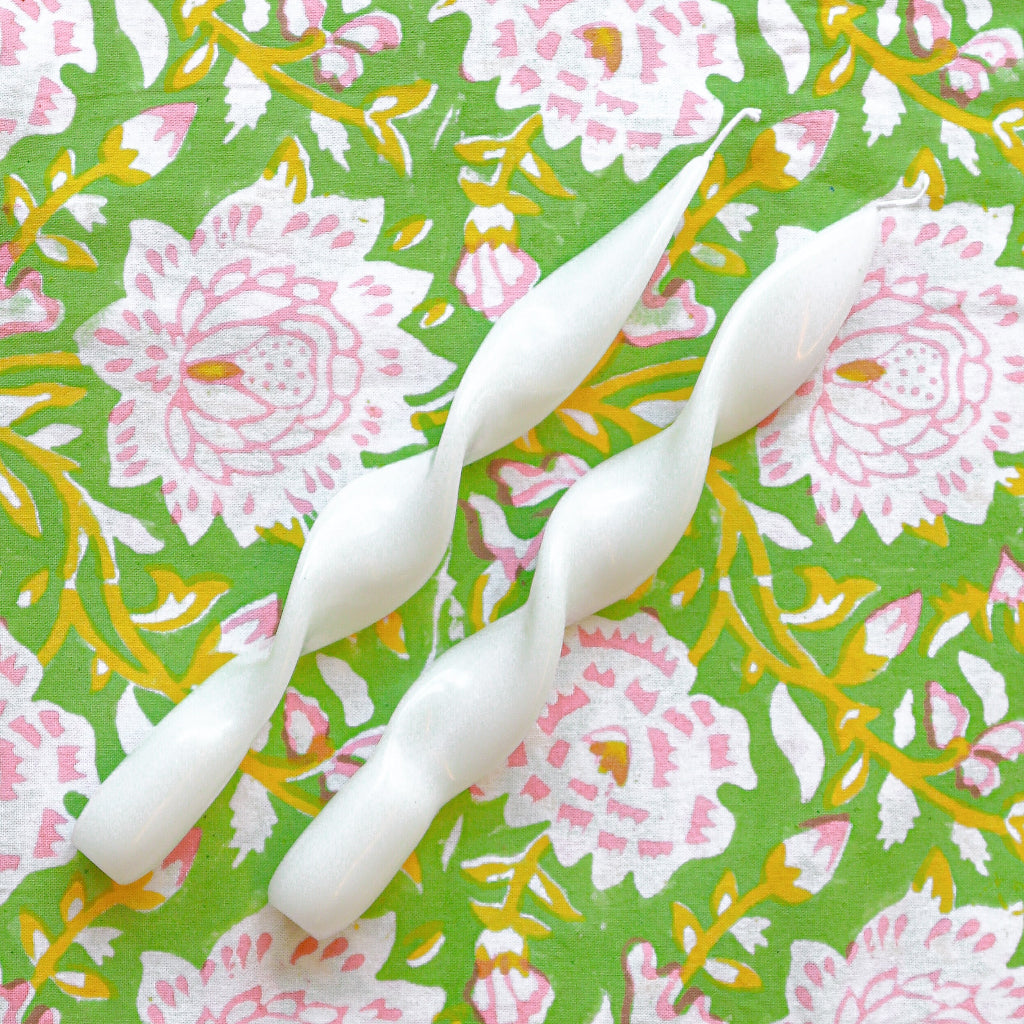 White Cotton Swirl Candle - Pack of 2 arranged with complementary tableware and decor - Ro'Table NYC