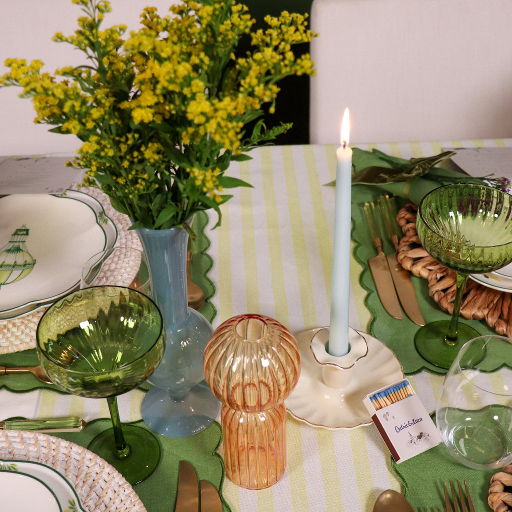 Extra Tall Baby Blue Cloud Taper Candles in a warm dinner party setting with candles and flowers - Ro'Table NYC