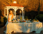 Safari Tablescape White linen featuring a delicate pistachio green design of subtle monkeys and floral patterns