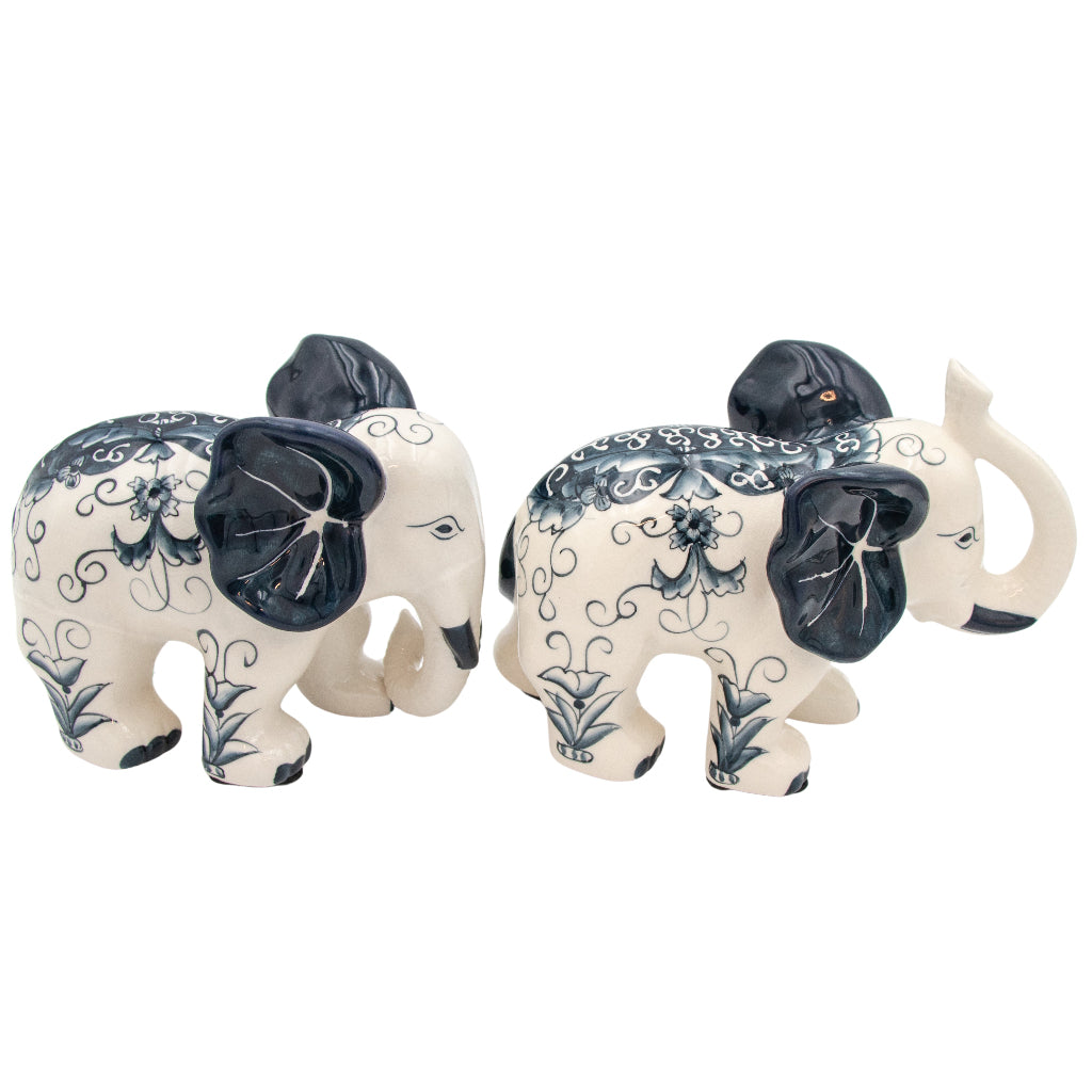 Hand-painted Ceramic Embera and Nyala Elephants - Pair in a warm dinner party setting with candles and flowers - Ro'Table NYC