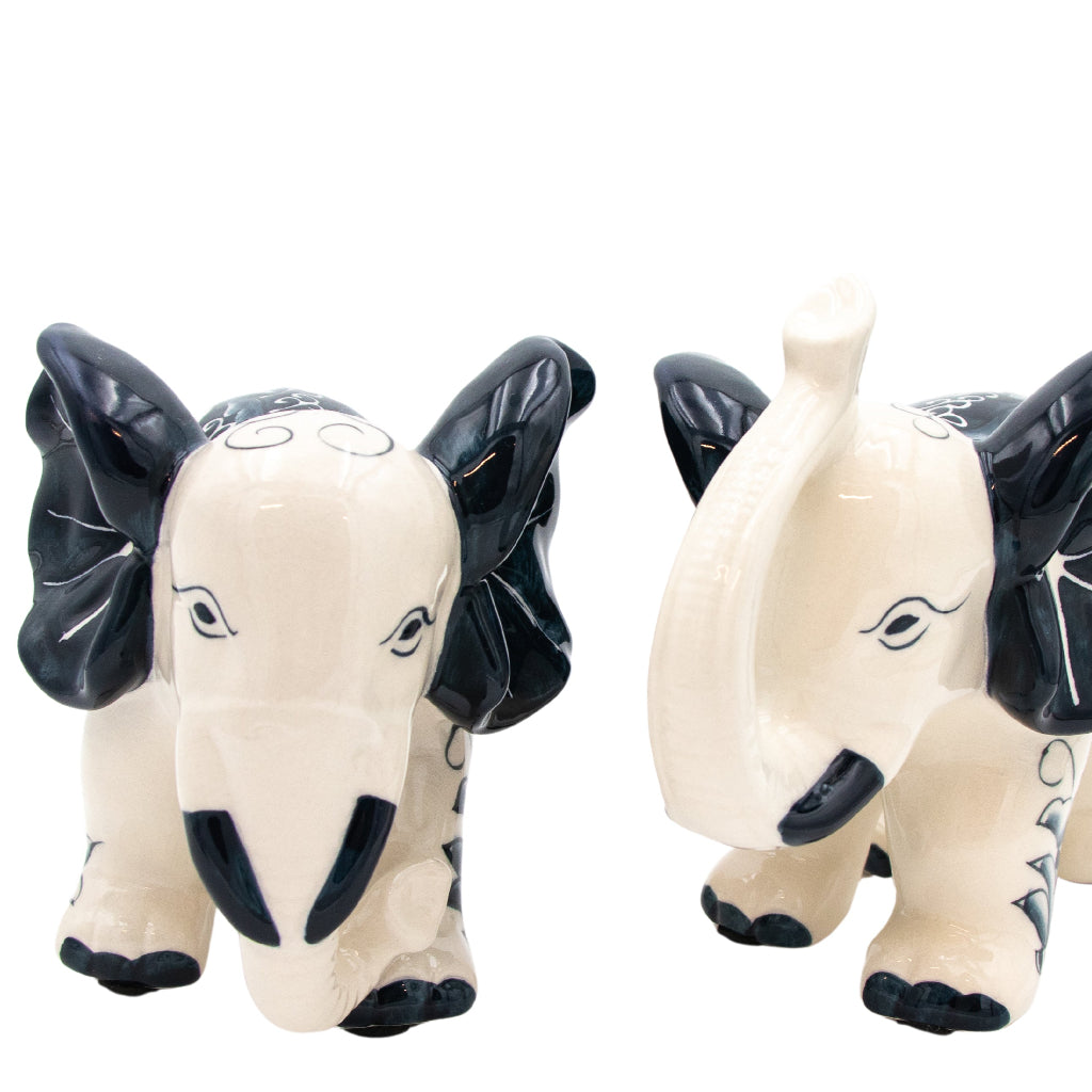 Hand-painted Ceramic Embera and Nyala Elephants - Pair in an elegantly decorated dining room setting - Ro'Table NYC