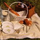 French Valensole Picnic with Yellow and White Tablelcoth in Linen, hot air balloon plates scalloped edging 