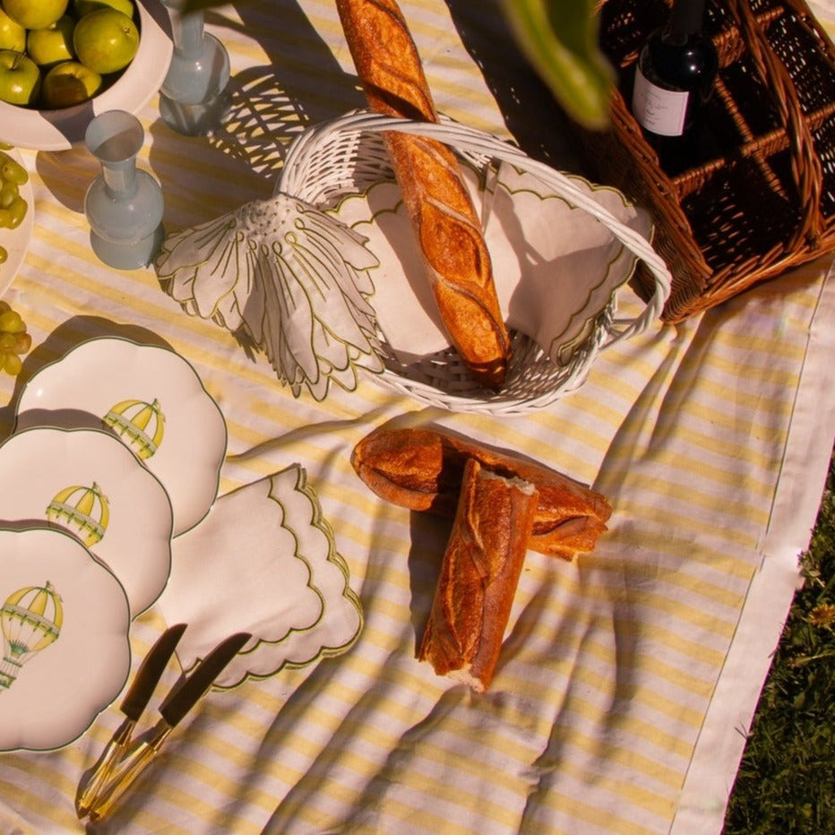 French Valensole Picnic with Yellow and White Tablelcoth in Linen, hot air balloon plates scalloped edging