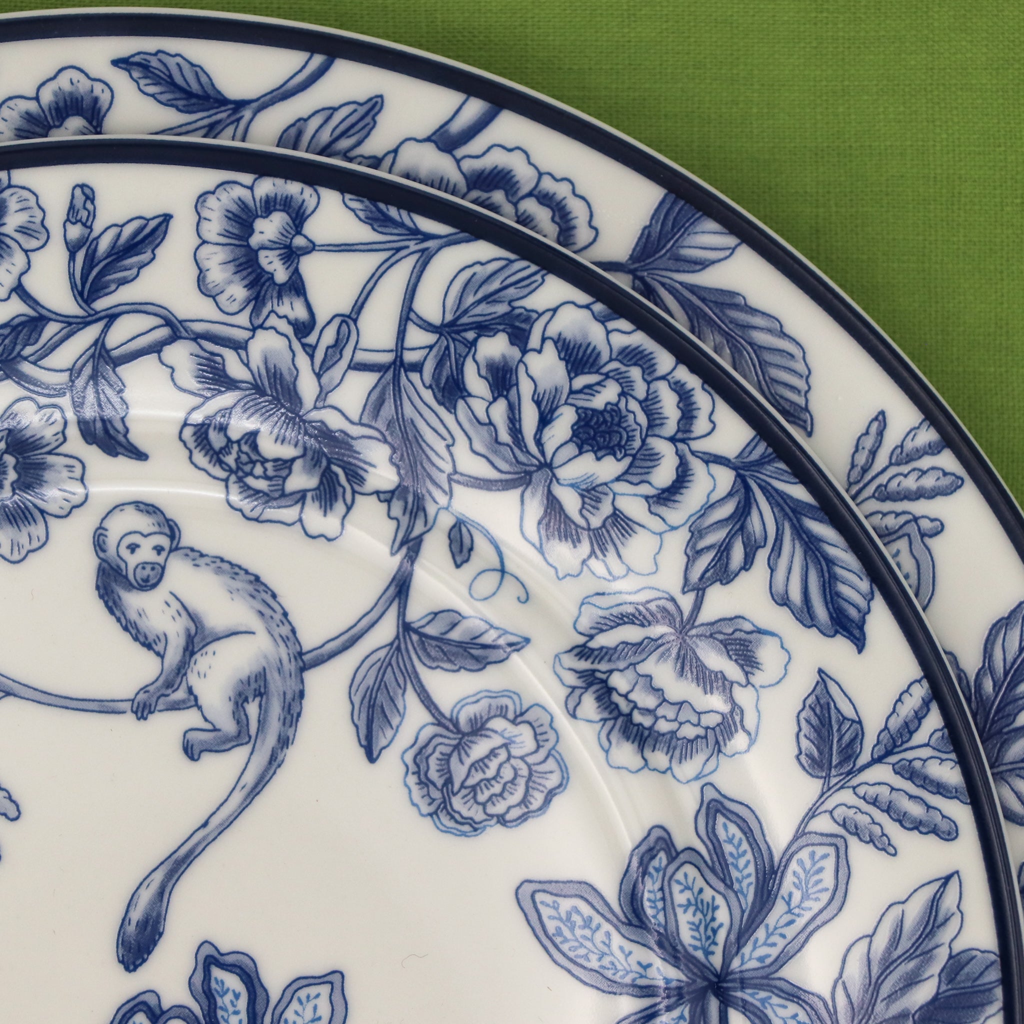 Close-up of Blue Floral Plate with Monkey