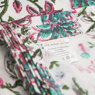 Organic Cotton Tablecloth by Ro'Table, With Lush Teal Blossoms and delicate pinks - reminiscent of a thriving gardenOrganic Cotton Tablecloth, With Lush Teal Blossoms and delicate pinks