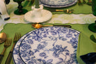 Blue Floral Plate with Monkey on a Green Placemat with Cutlery