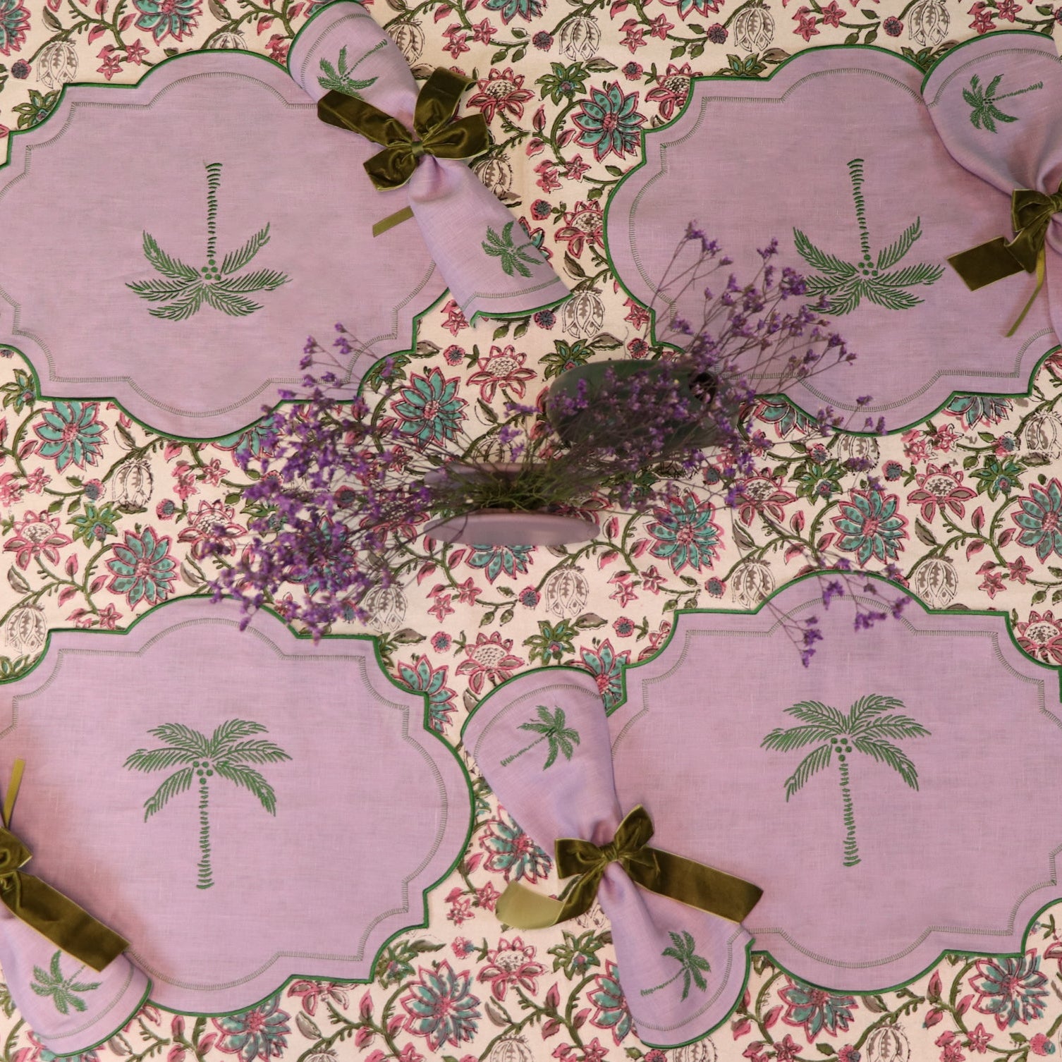 Tablescape of lilacs and Greens, Palm Springs with then Palm Motif on Placemats with Matching Napkins