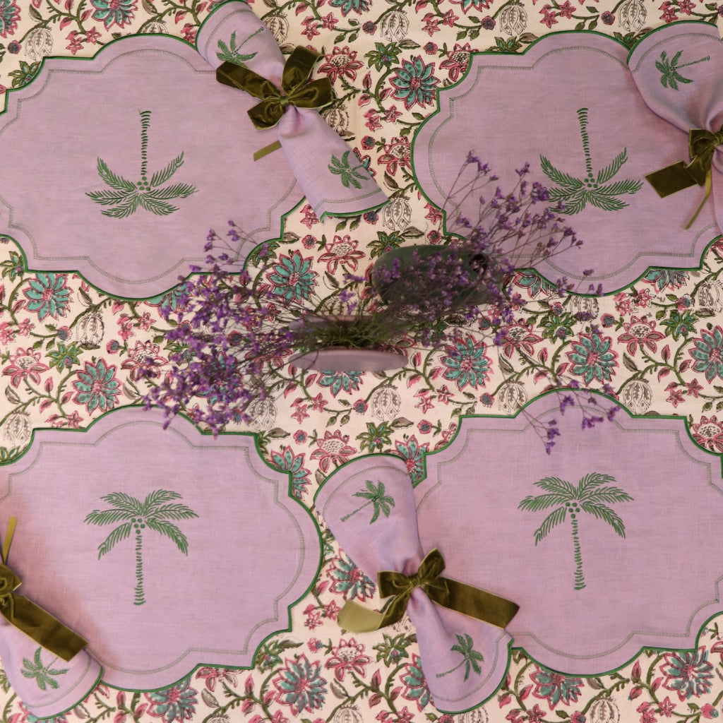 100% Organic Cotton - Pendula Petunia Tablecloth in a warm dinner party setting with candles and flowers - Ro'Table NYC