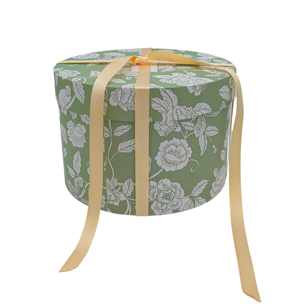 Round Gift Box with Lid in a warm dinner party setting with candles and flowers - Ro'Table NYC