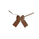 Pink velvet bow napkin holder on a white background - Ro'Table NYC