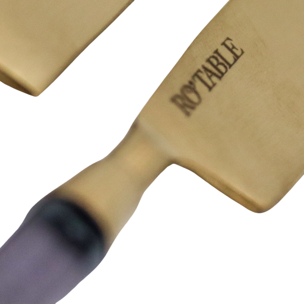 Set Midnight Blue Cutlery in a warm dinner party setting with candles and flowers - Ro'Table NYC