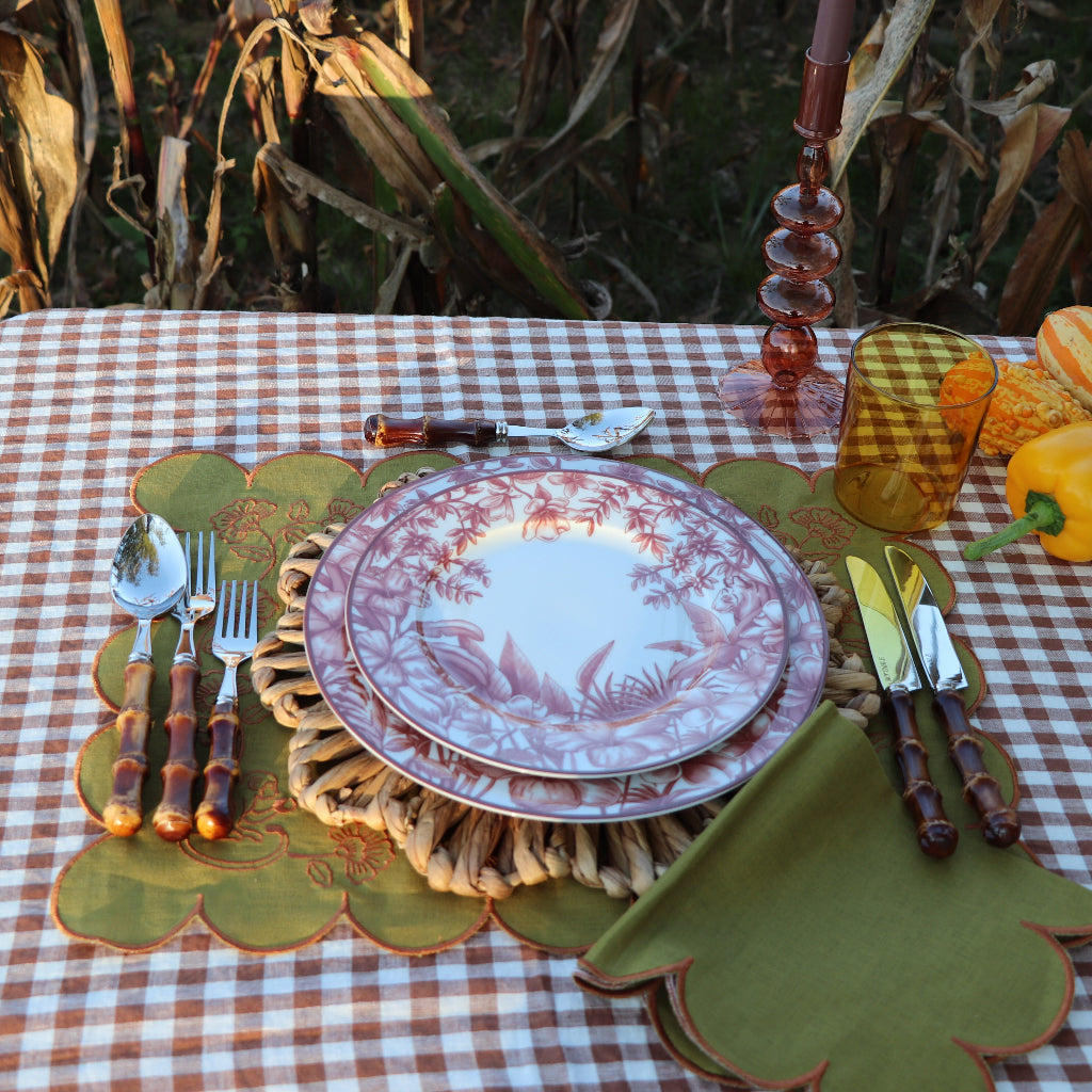 Scalloped Natural Rattan Charger overhead view showing artisan print detail - Ro'Table NYC placemat